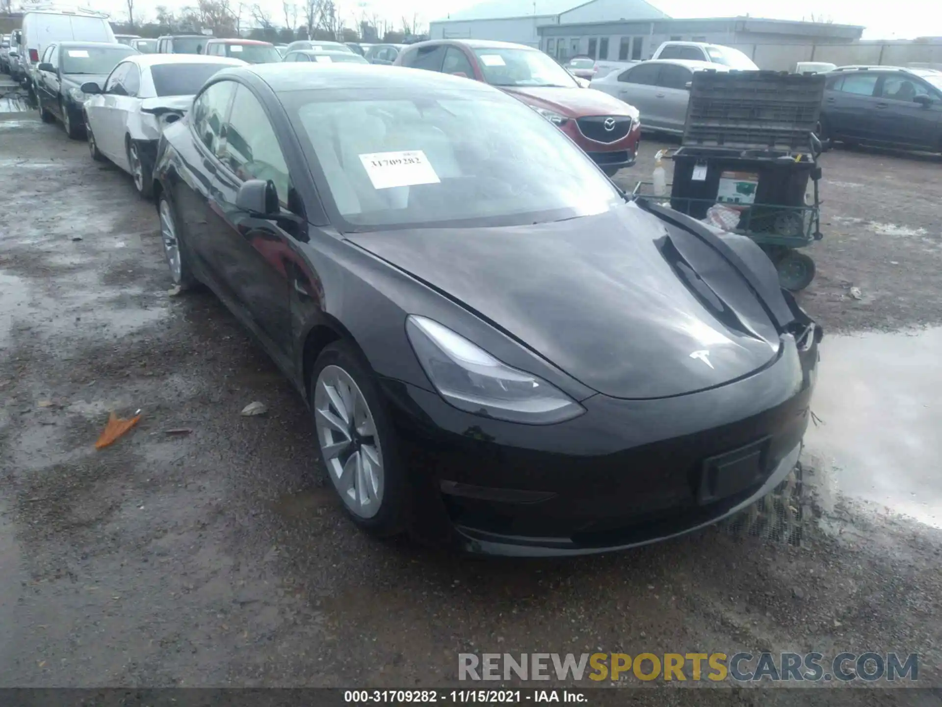 1 Photograph of a damaged car 5YJ3E1EB7MF903008 TESLA MODEL 3 2021