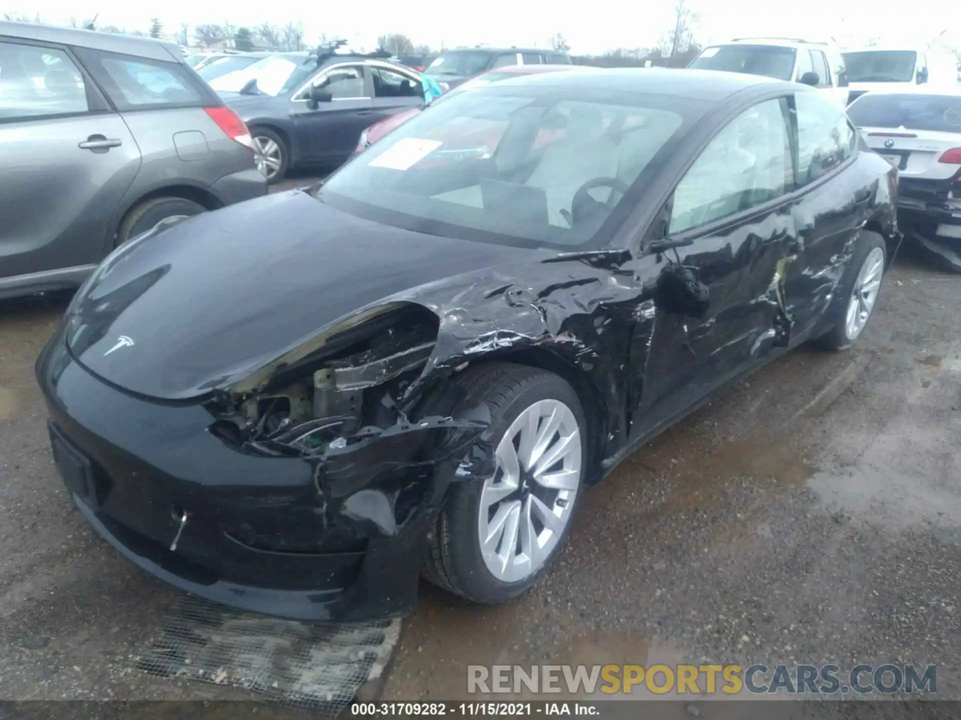 2 Photograph of a damaged car 5YJ3E1EB7MF903008 TESLA MODEL 3 2021