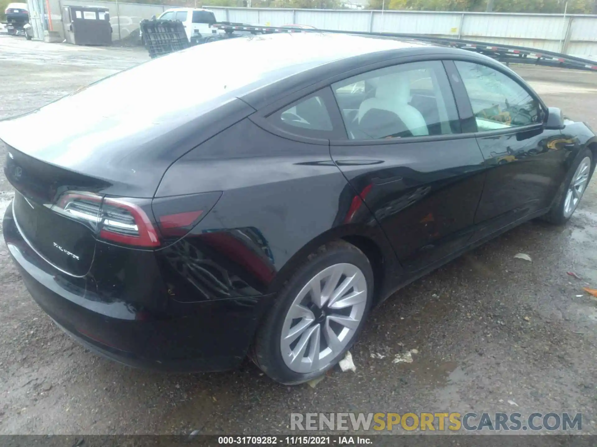 4 Photograph of a damaged car 5YJ3E1EB7MF903008 TESLA MODEL 3 2021