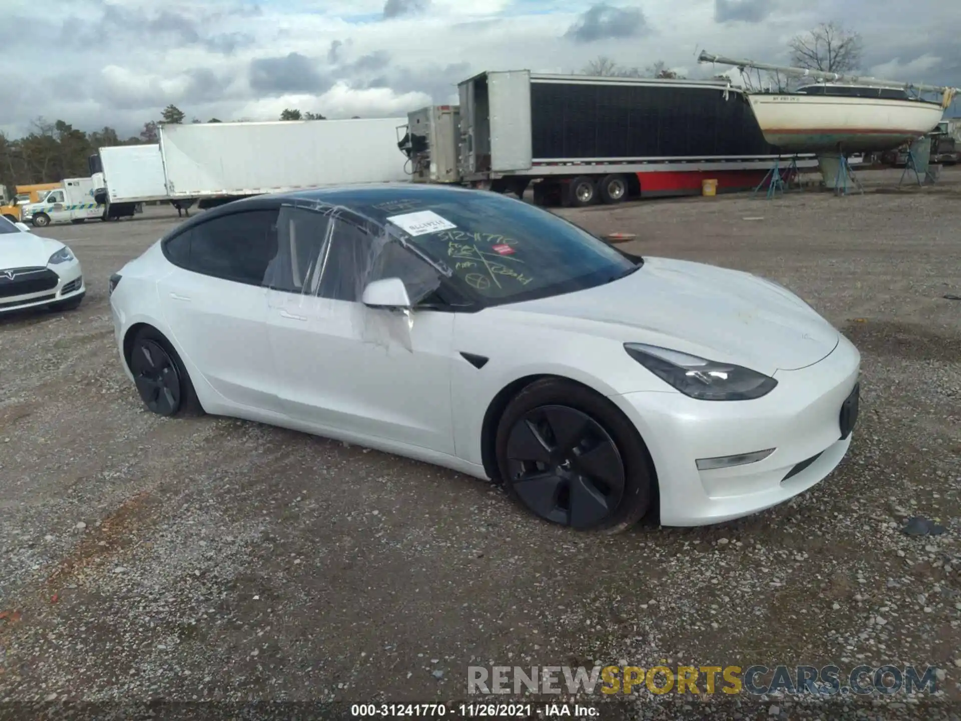 1 Photograph of a damaged car 5YJ3E1EB7MF924795 TESLA MODEL 3 2021