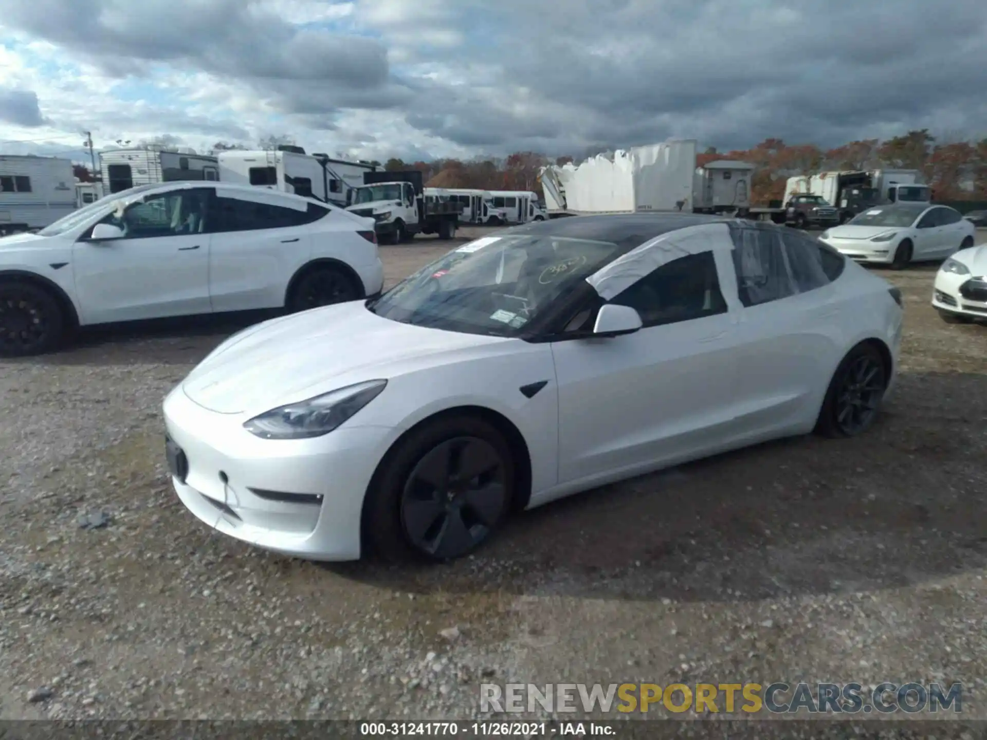 2 Photograph of a damaged car 5YJ3E1EB7MF924795 TESLA MODEL 3 2021