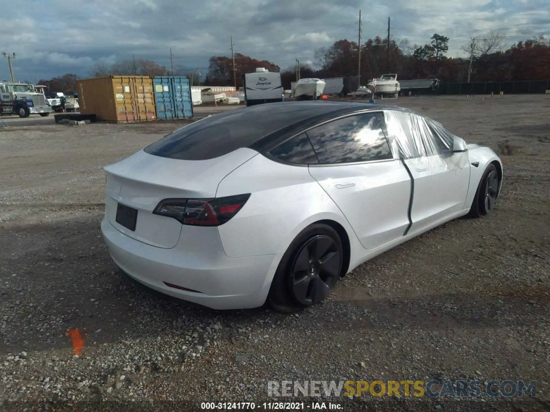 4 Photograph of a damaged car 5YJ3E1EB7MF924795 TESLA MODEL 3 2021