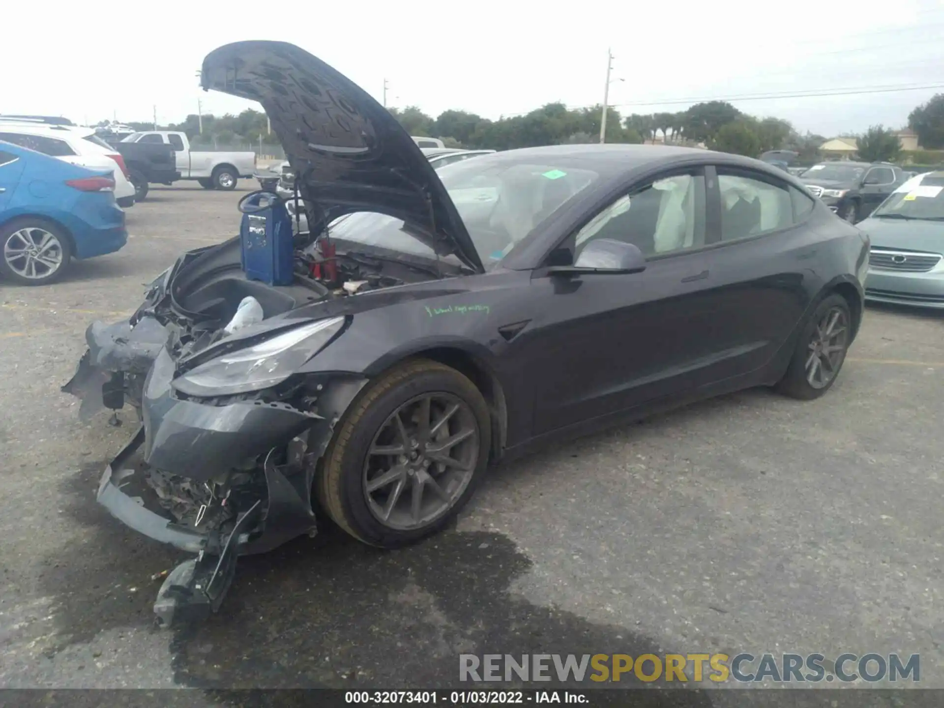 2 Photograph of a damaged car 5YJ3E1EB7MF965475 TESLA MODEL 3 2021