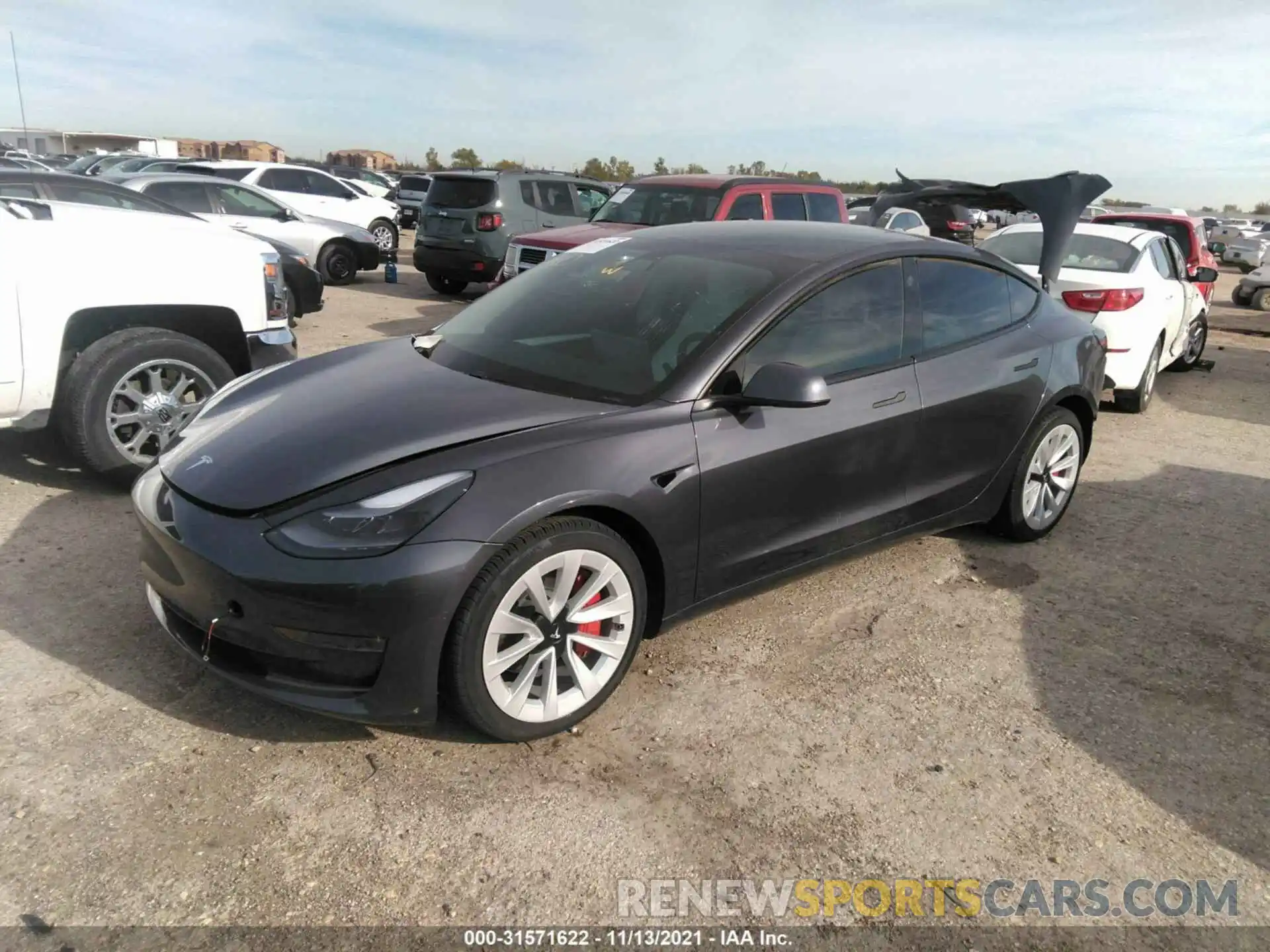 2 Photograph of a damaged car 5YJ3E1EB7MF975374 TESLA MODEL 3 2021