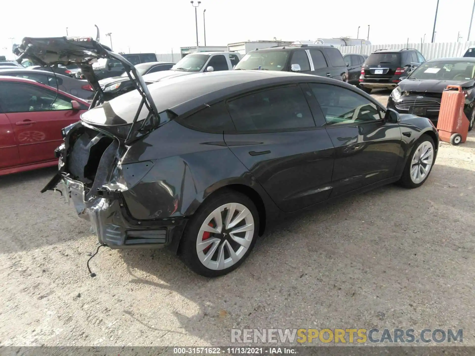 4 Photograph of a damaged car 5YJ3E1EB7MF975374 TESLA MODEL 3 2021