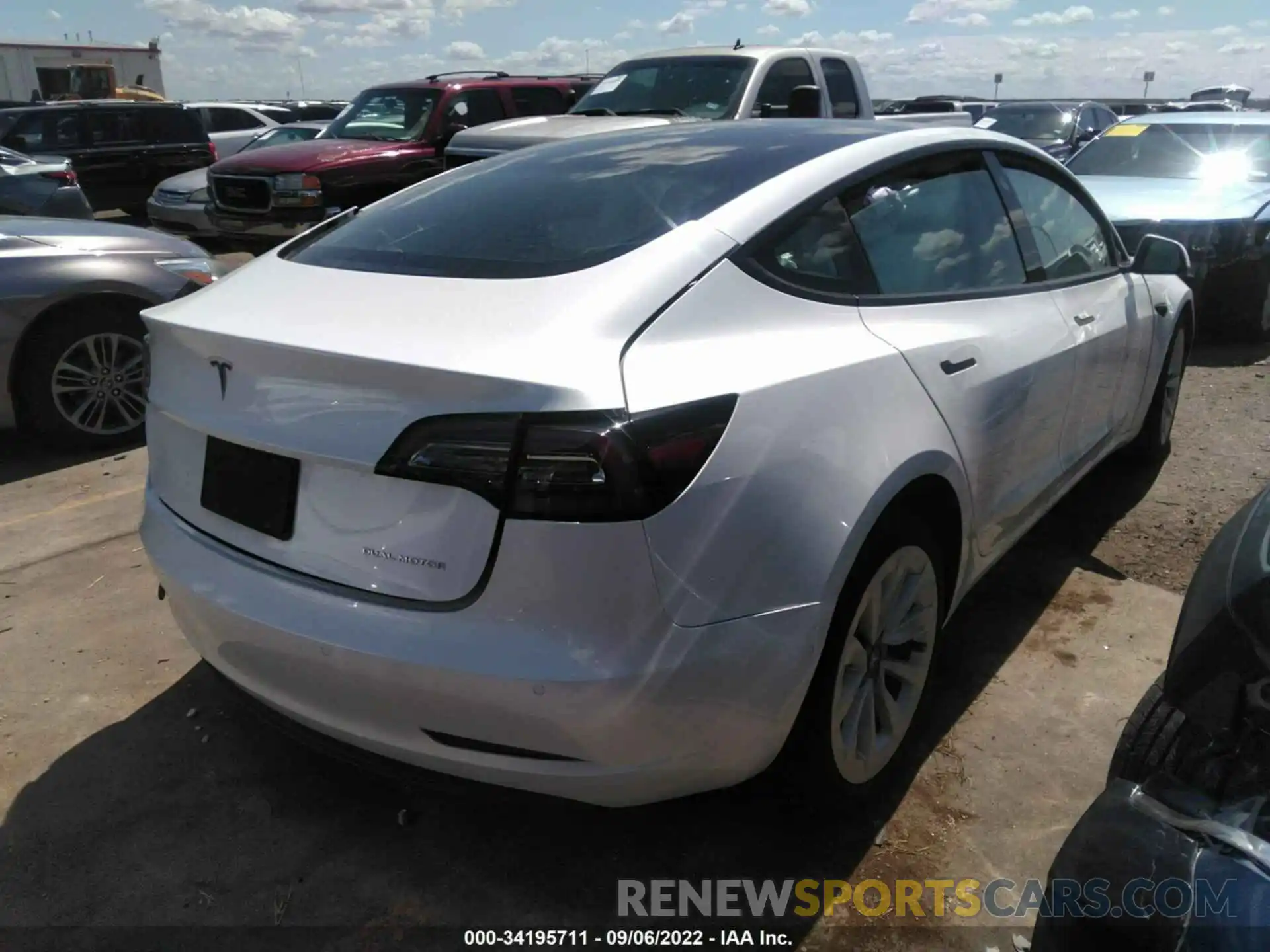 4 Photograph of a damaged car 5YJ3E1EB7MF990117 TESLA MODEL 3 2021