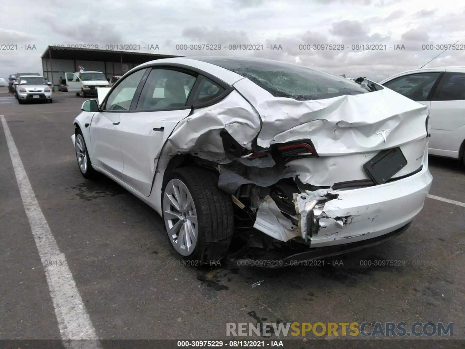 3 Photograph of a damaged car 5YJ3E1EB7MF990294 TESLA MODEL 3 2021