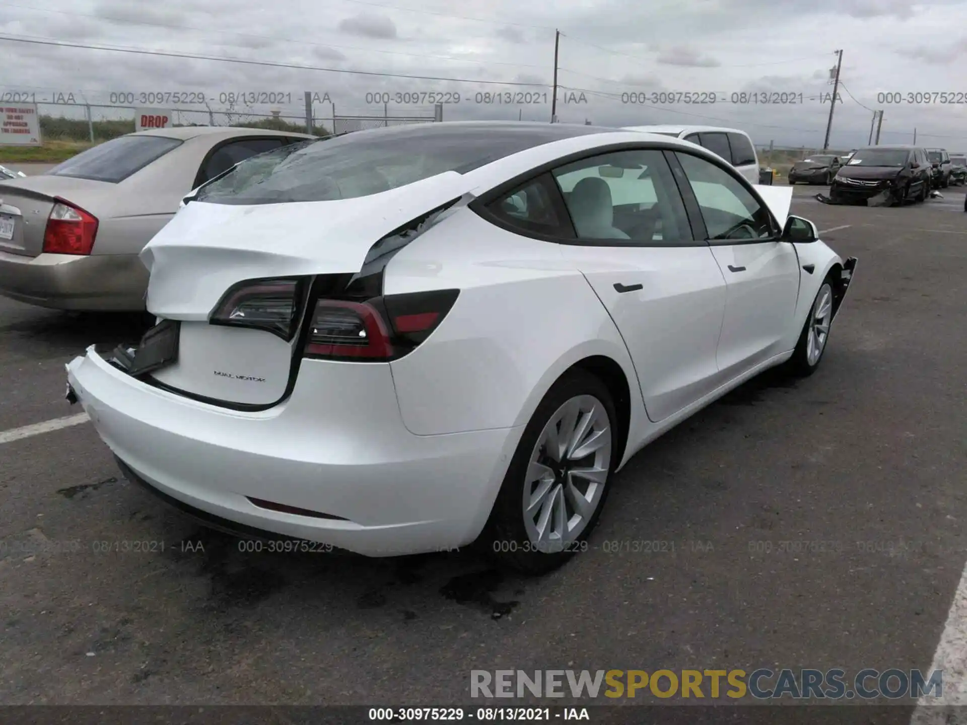 4 Фотография поврежденного автомобиля 5YJ3E1EB7MF990294 TESLA MODEL 3 2021