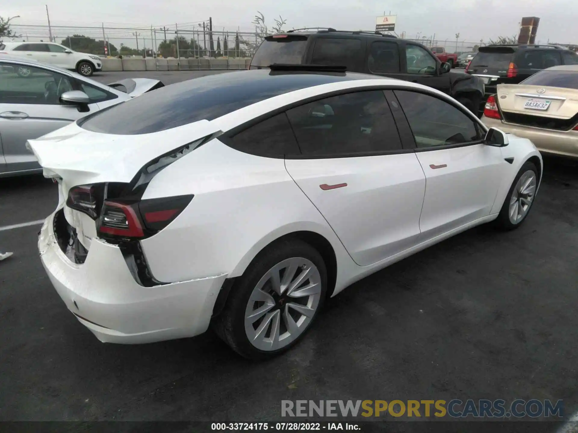 4 Photograph of a damaged car 5YJ3E1EB7MF990327 TESLA MODEL 3 2021