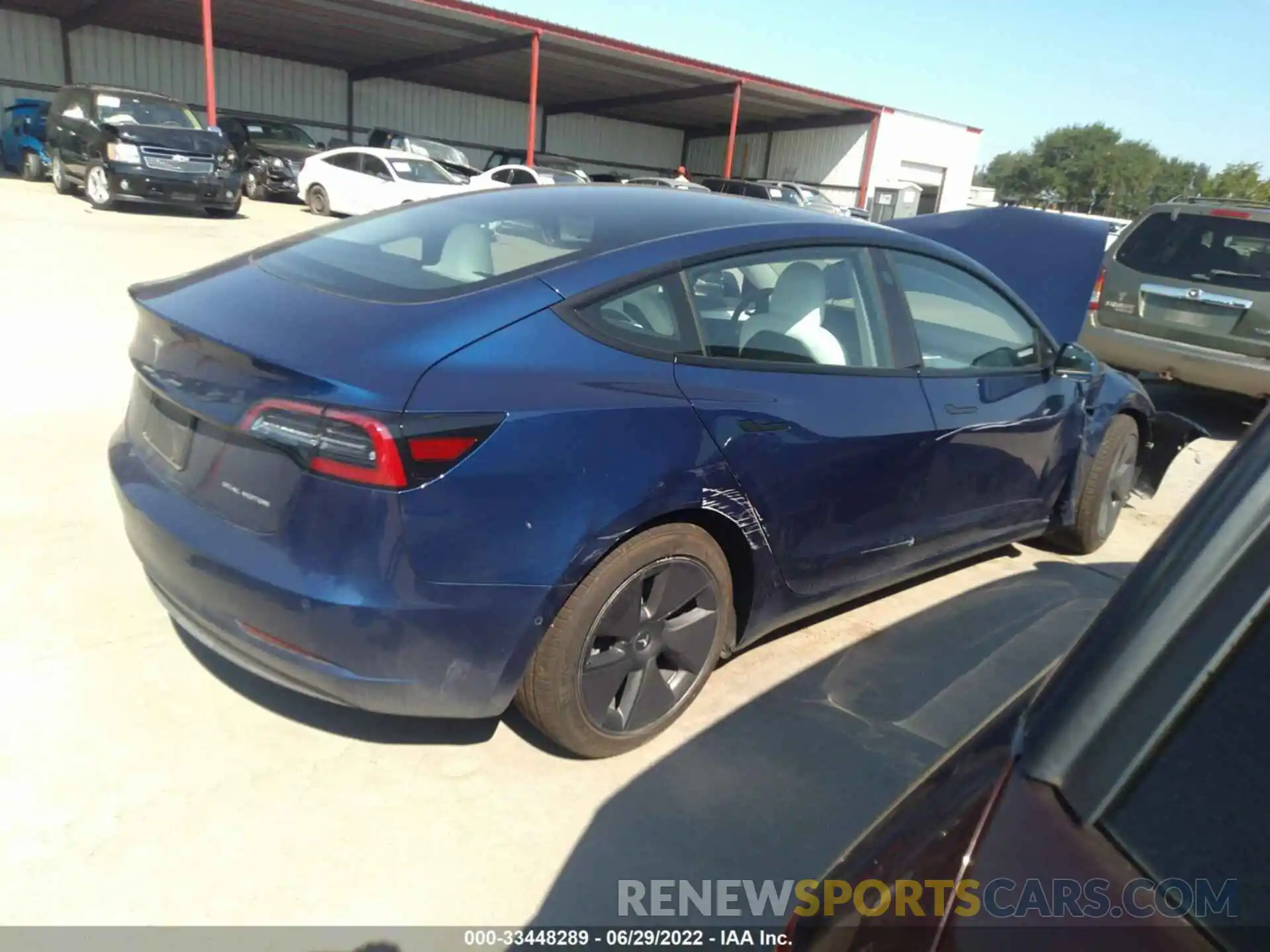 4 Photograph of a damaged car 5YJ3E1EB7MF992899 TESLA MODEL 3 2021