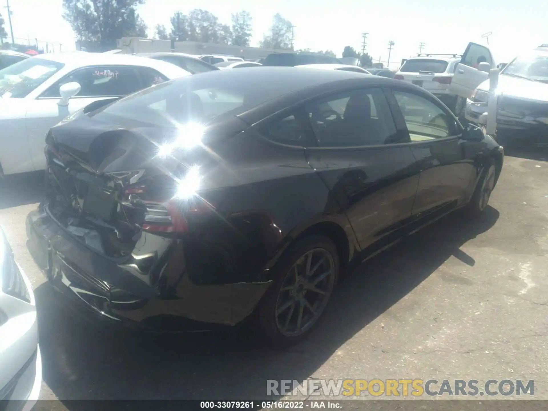 4 Photograph of a damaged car 5YJ3E1EB8MF014783 TESLA MODEL 3 2021