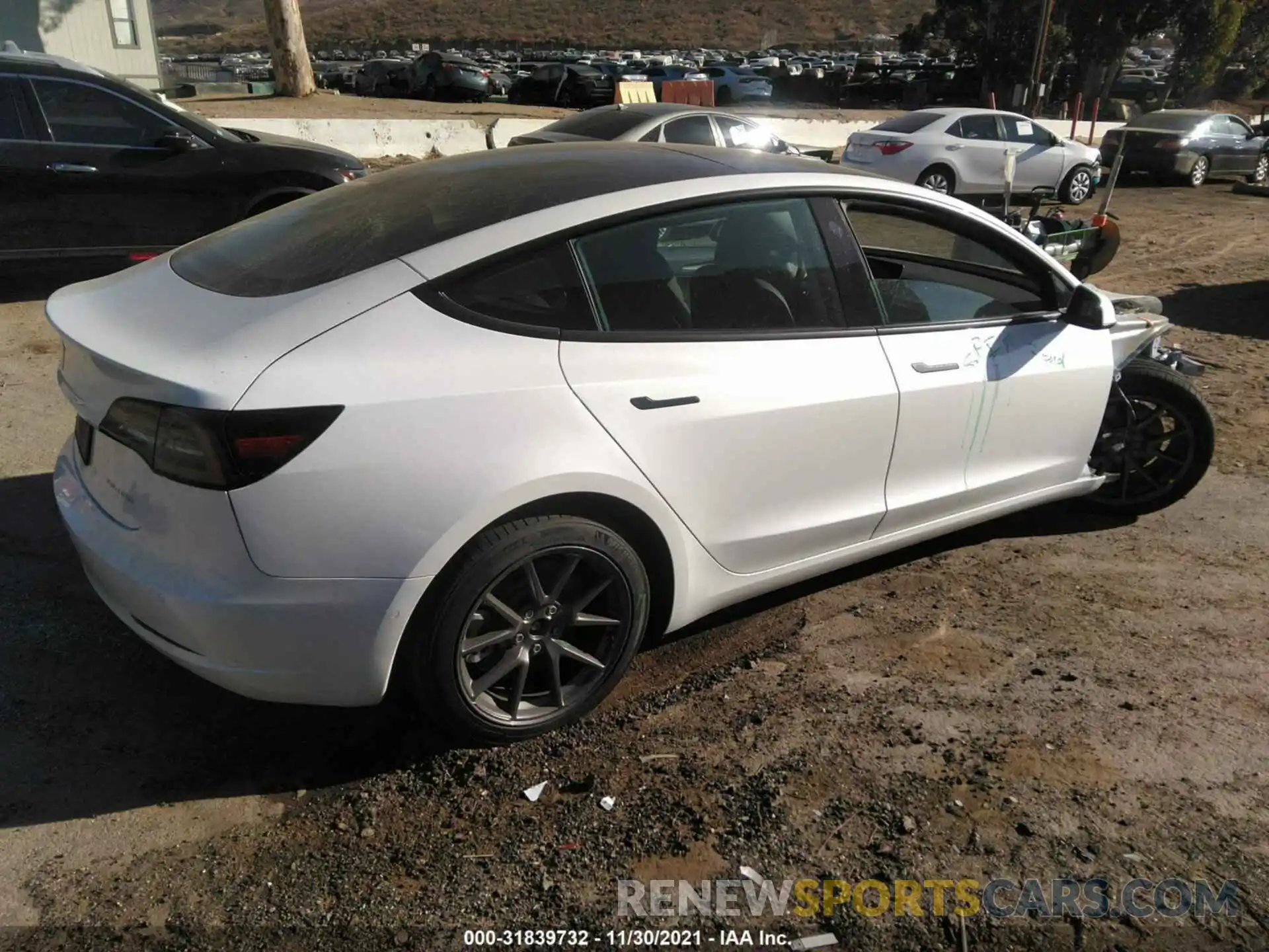 4 Photograph of a damaged car 5YJ3E1EB8MF071632 TESLA MODEL 3 2021