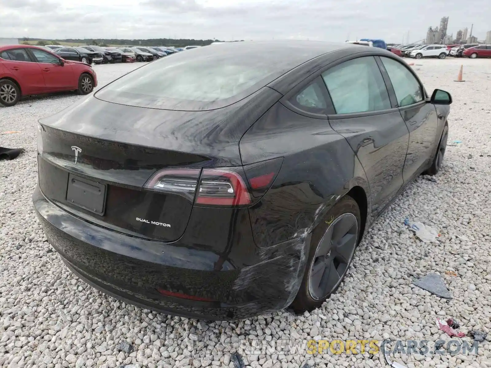 4 Photograph of a damaged car 5YJ3E1EB8MF863621 TESLA MODEL 3 2021