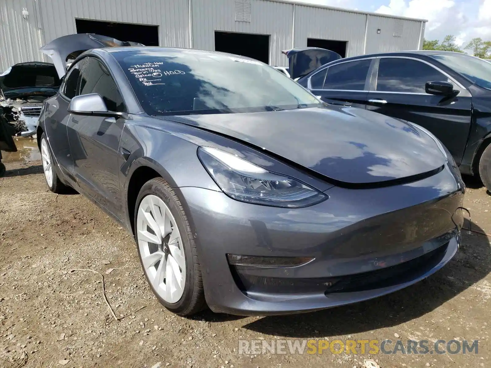 1 Photograph of a damaged car 5YJ3E1EB8MF902658 TESLA MODEL 3 2021