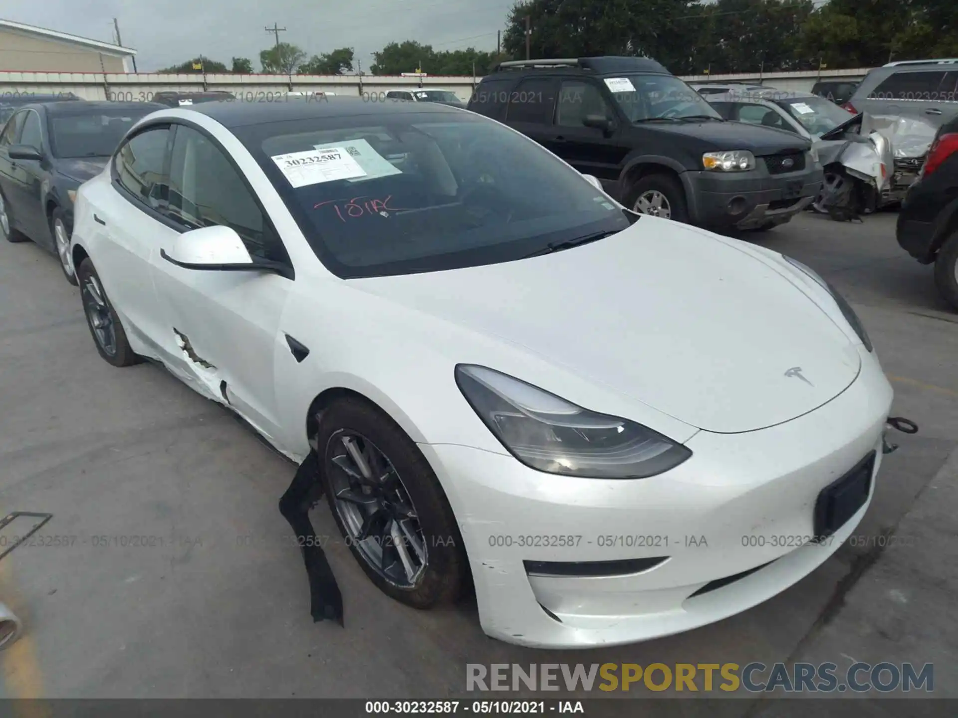 1 Photograph of a damaged car 5YJ3E1EB8MF902708 TESLA MODEL 3 2021