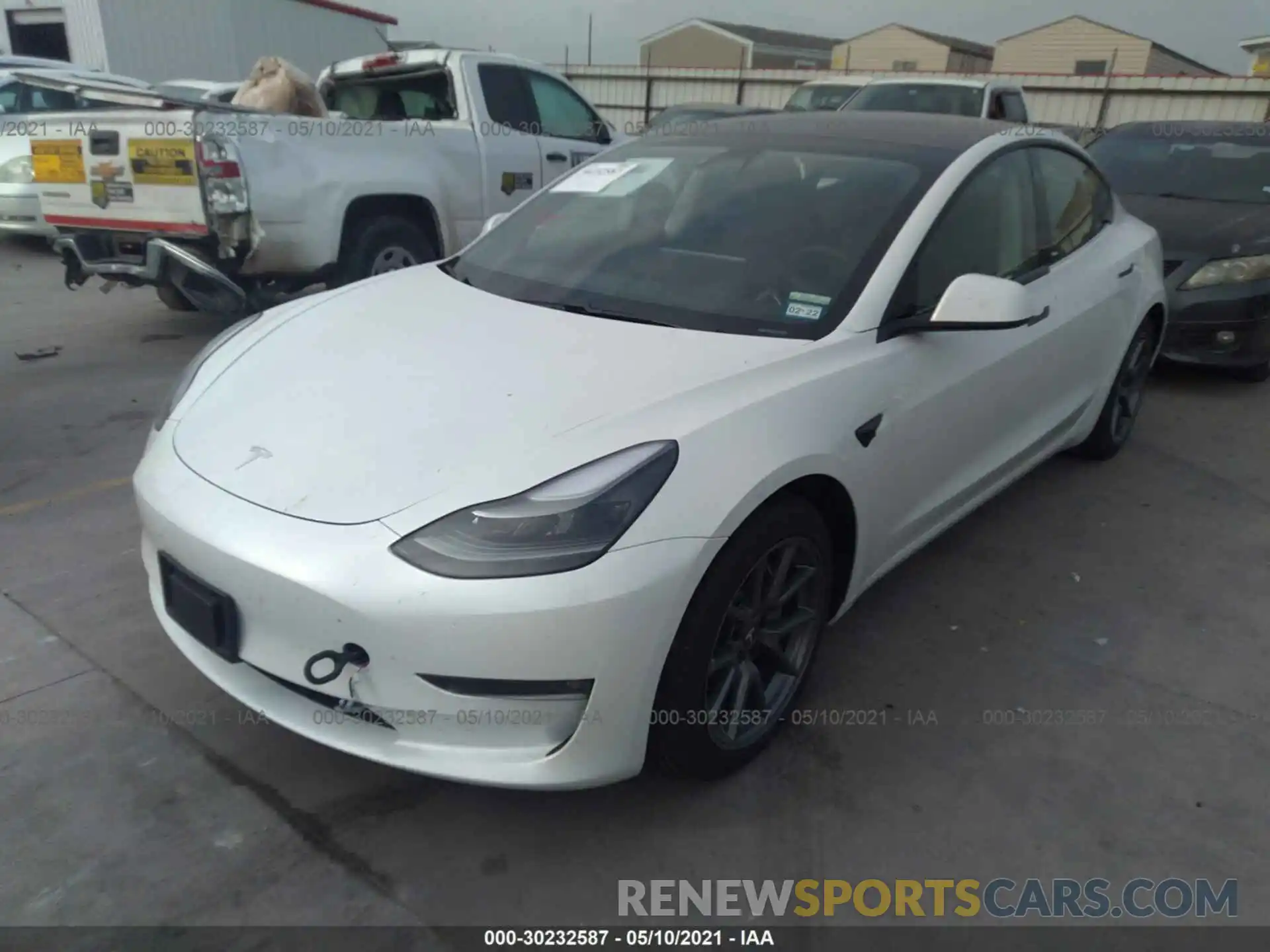 2 Photograph of a damaged car 5YJ3E1EB8MF902708 TESLA MODEL 3 2021