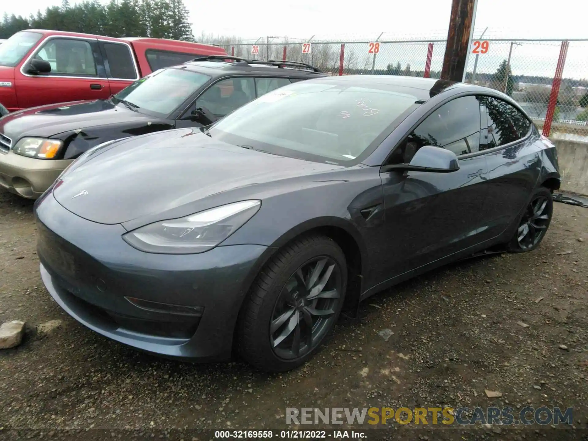 2 Photograph of a damaged car 5YJ3E1EB8MF927995 TESLA MODEL 3 2021