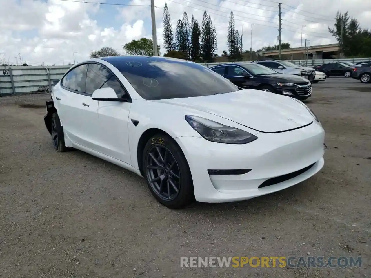 1 Photograph of a damaged car 5YJ3E1EB8MF975805 TESLA MODEL 3 2021