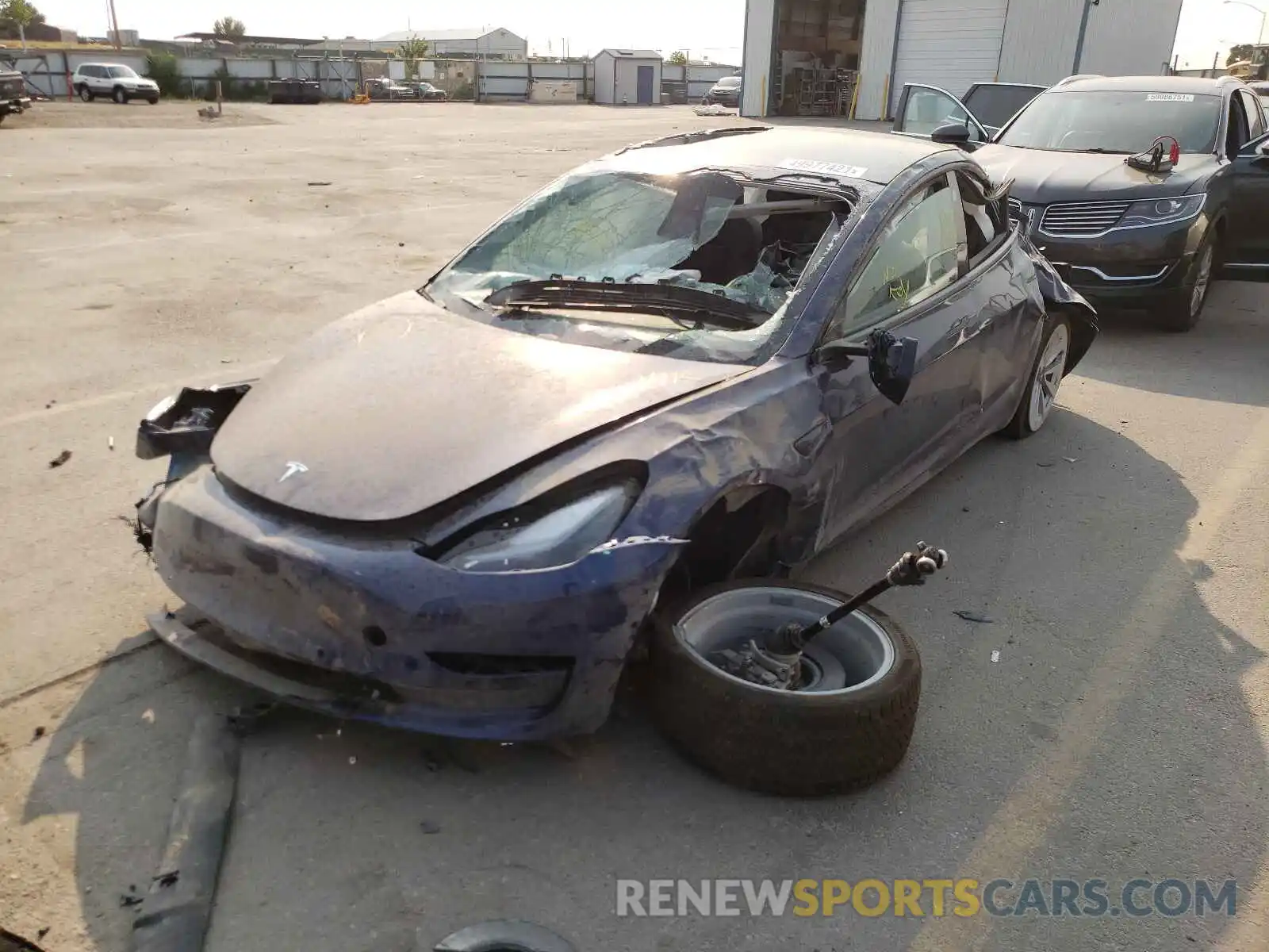 2 Photograph of a damaged car 5YJ3E1EB8MF990076 TESLA MODEL 3 2021