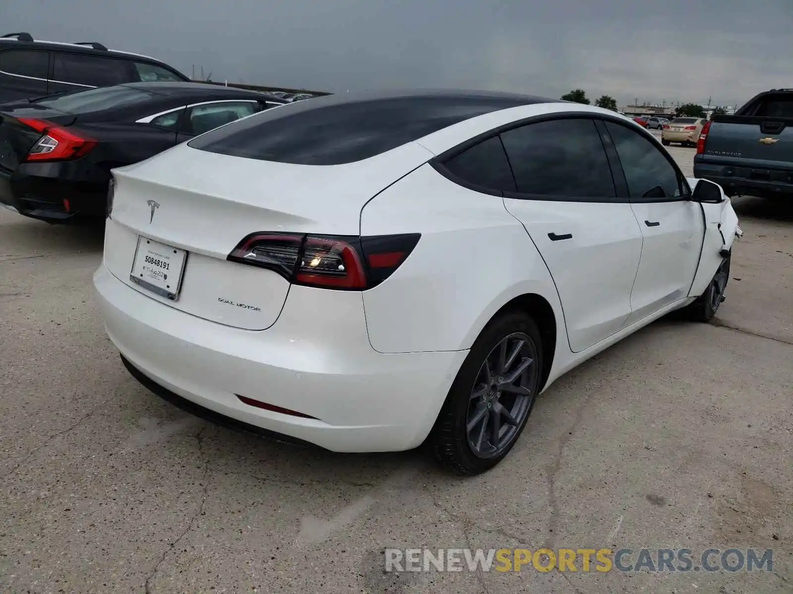 4 Photograph of a damaged car 5YJ3E1EB8MF992281 TESLA MODEL 3 2021