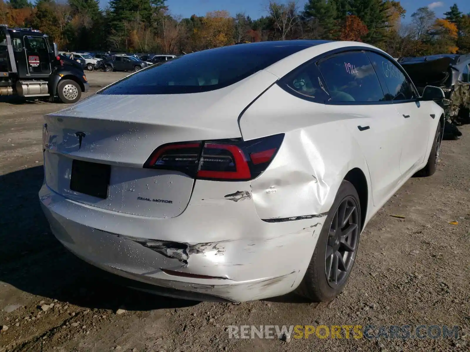 4 Photograph of a damaged car 5YJ3E1EB9MF013318 TESLA MODEL 3 2021