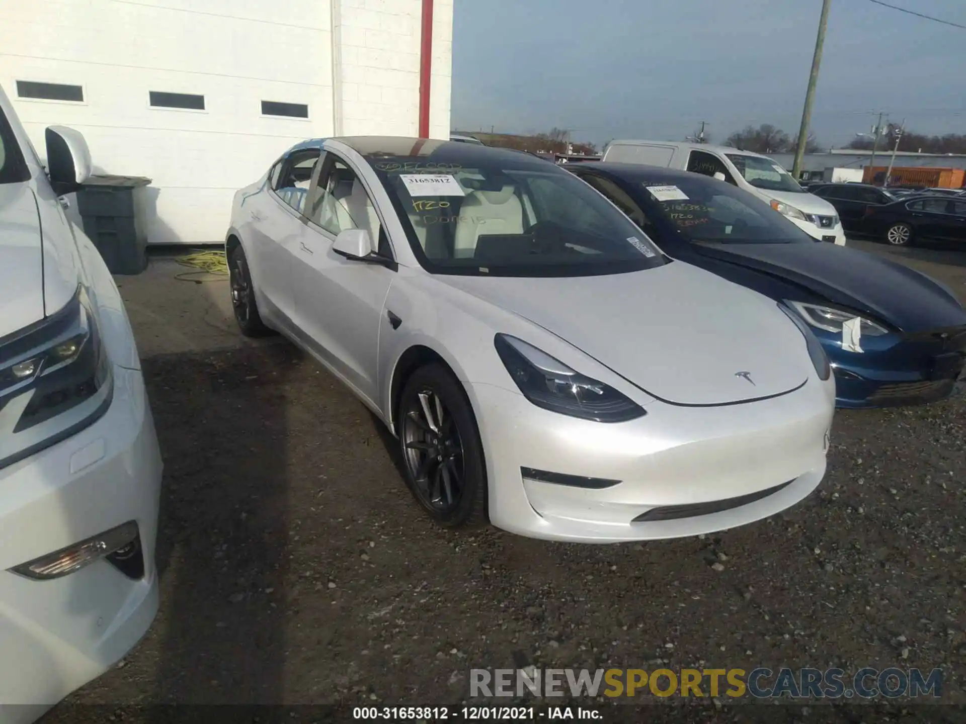 1 Photograph of a damaged car 5YJ3E1EB9MF035738 TESLA MODEL 3 2021