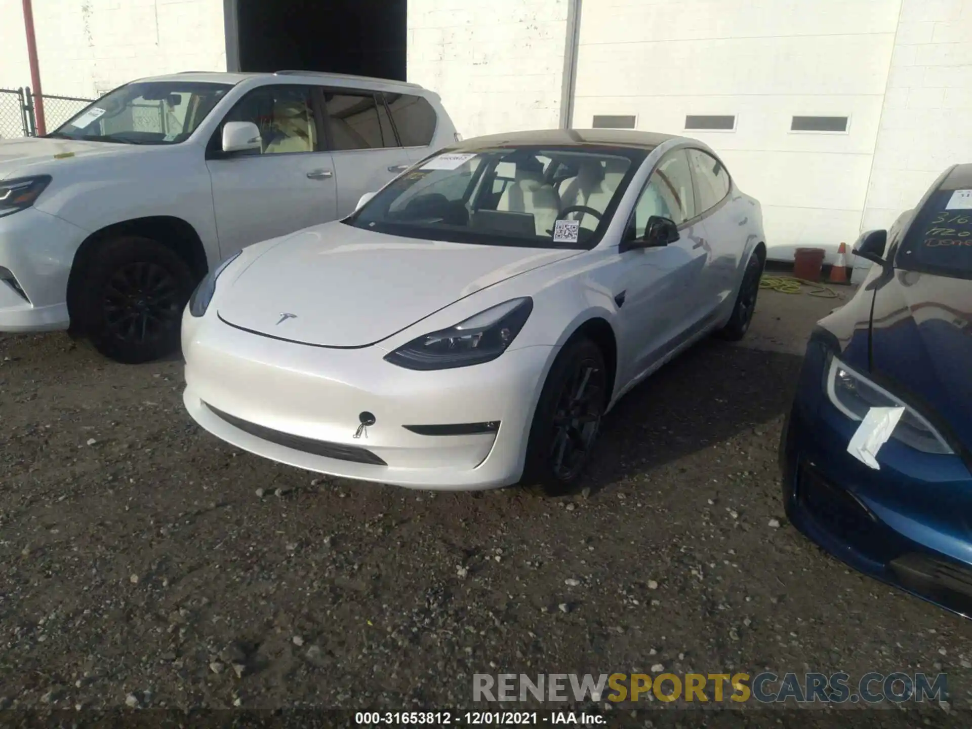 2 Photograph of a damaged car 5YJ3E1EB9MF035738 TESLA MODEL 3 2021