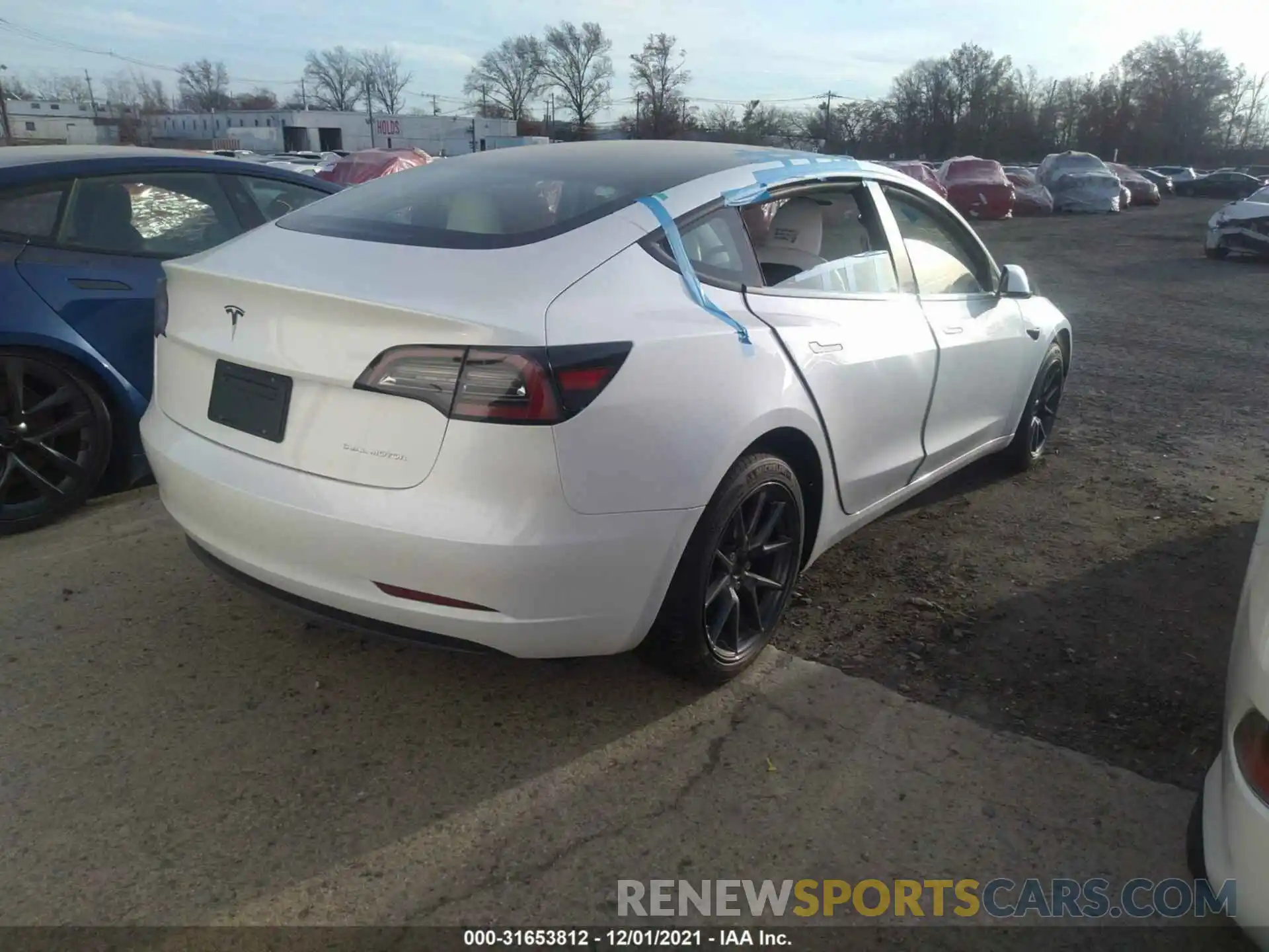 4 Photograph of a damaged car 5YJ3E1EB9MF035738 TESLA MODEL 3 2021