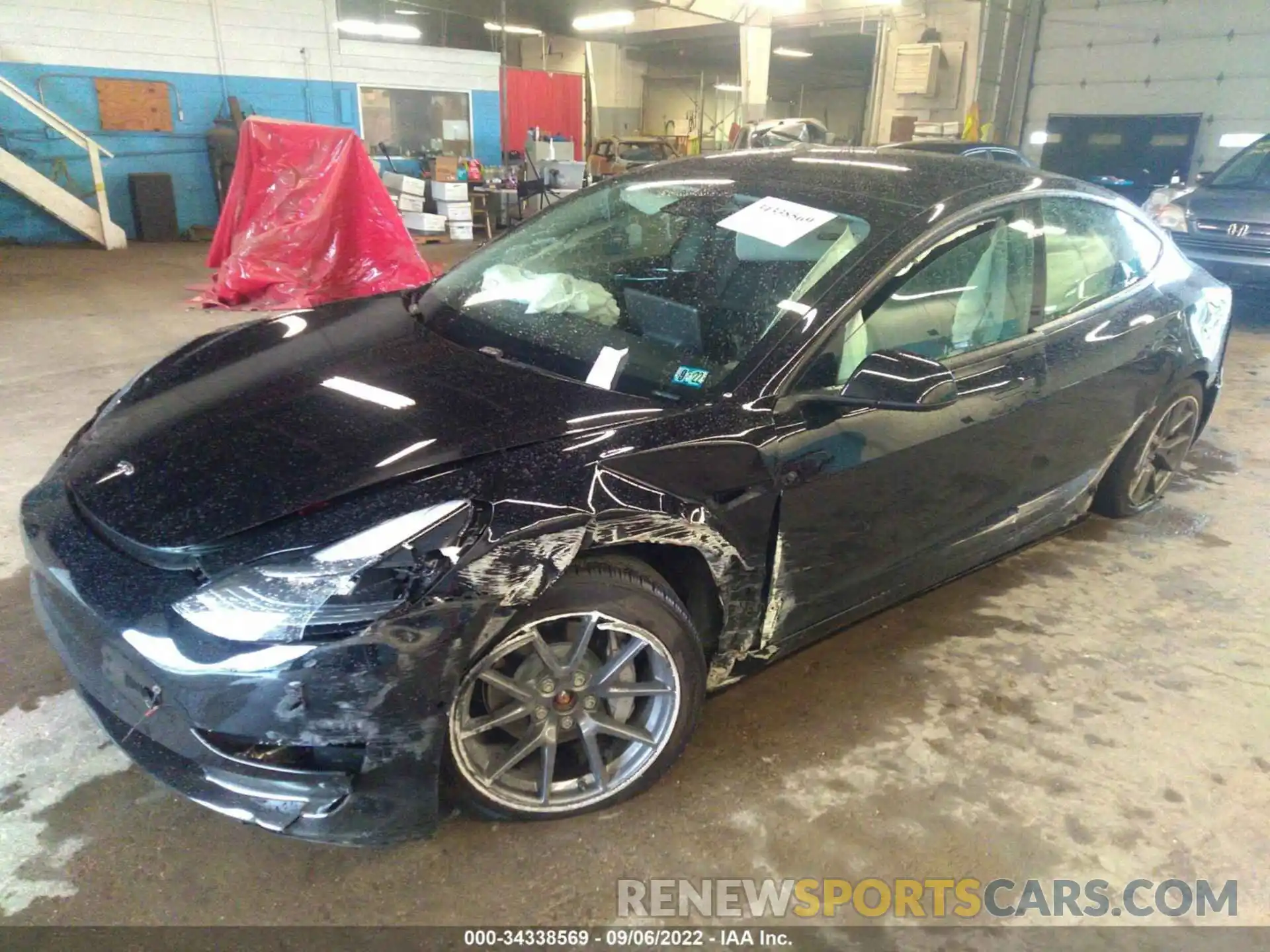 2 Photograph of a damaged car 5YJ3E1EB9MF044276 TESLA MODEL 3 2021