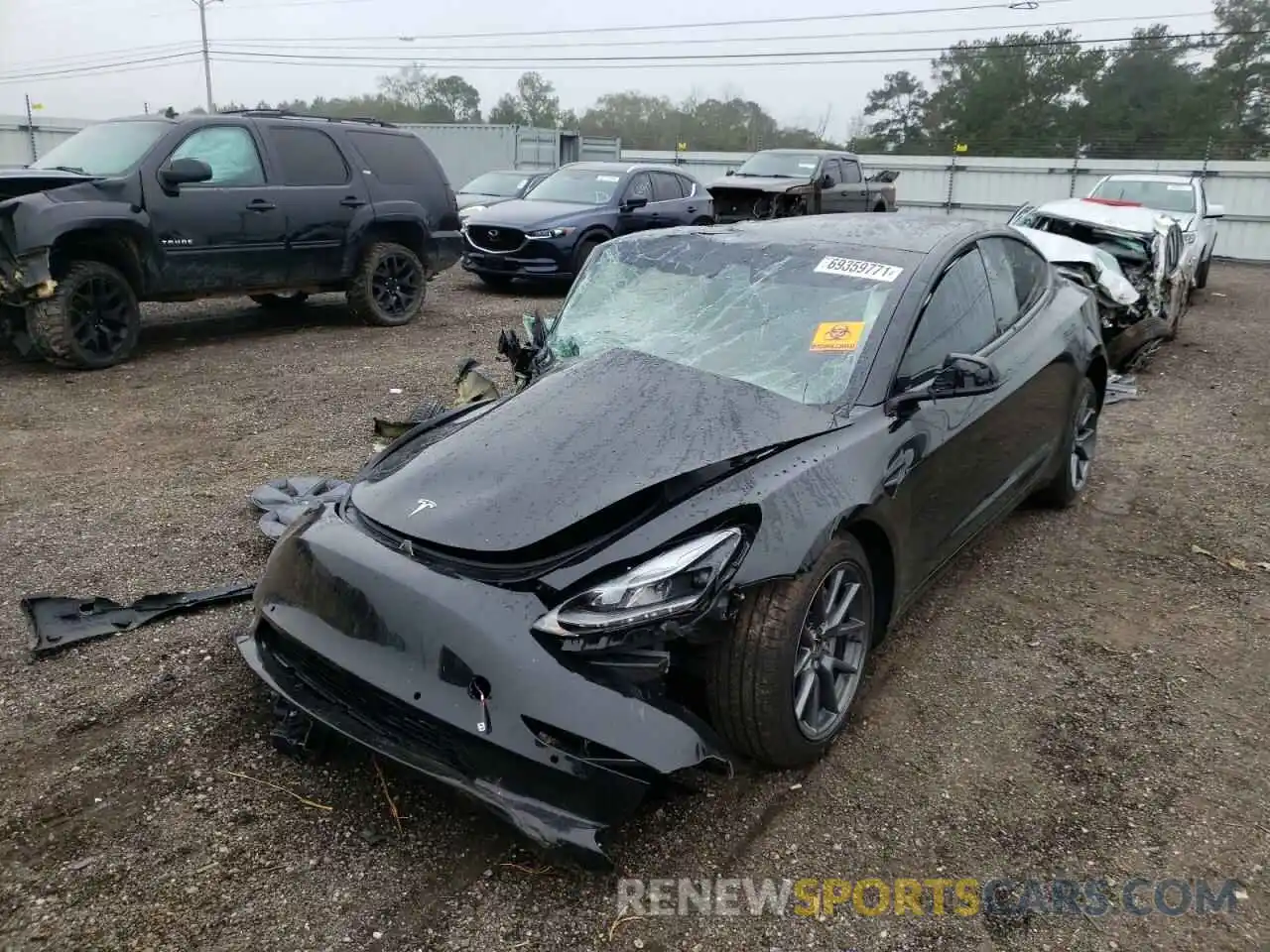 2 Photograph of a damaged car 5YJ3E1EB9MF062504 TESLA MODEL 3 2021