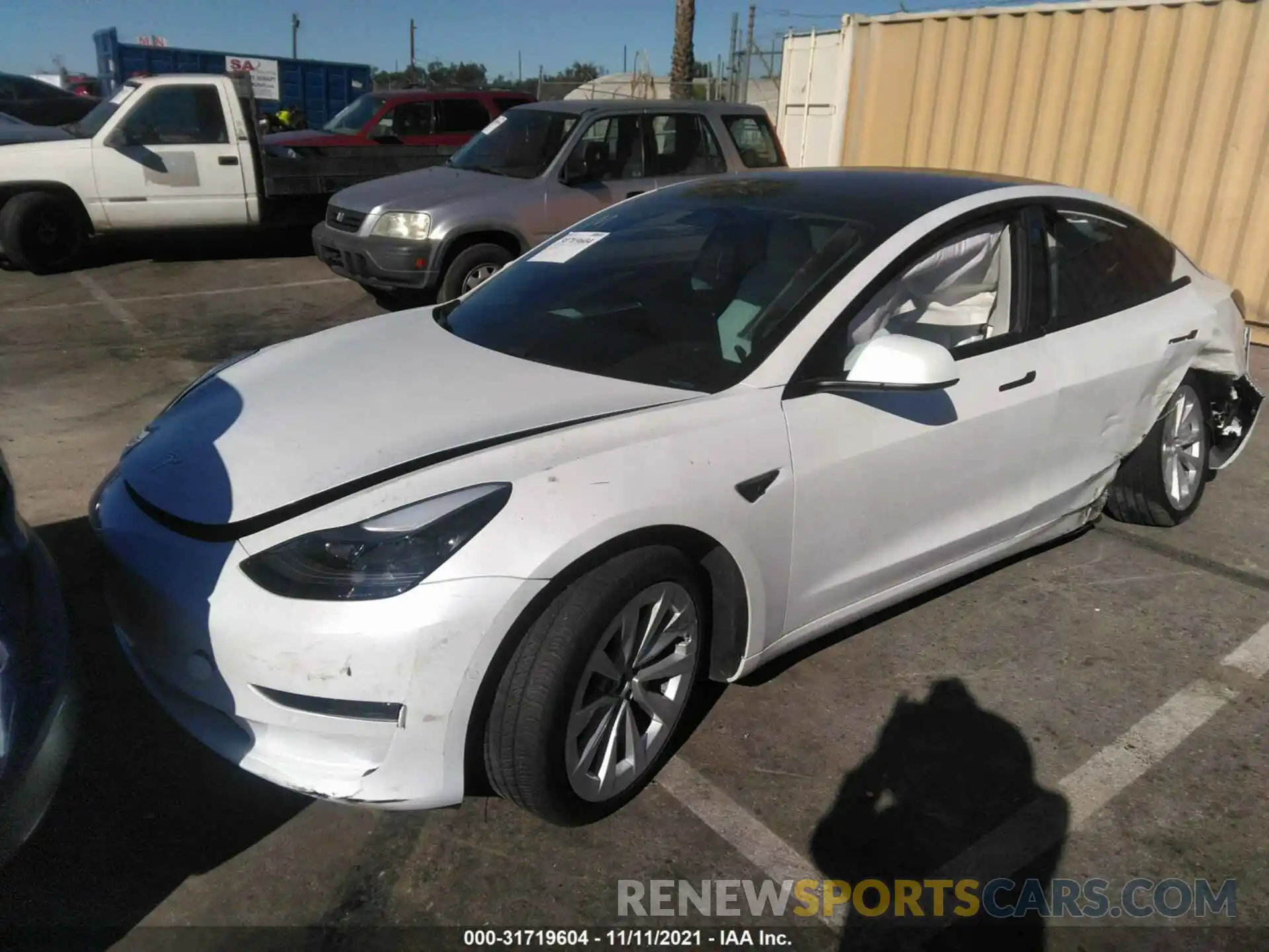 2 Photograph of a damaged car 5YJ3E1EB9MF078847 TESLA MODEL 3 2021