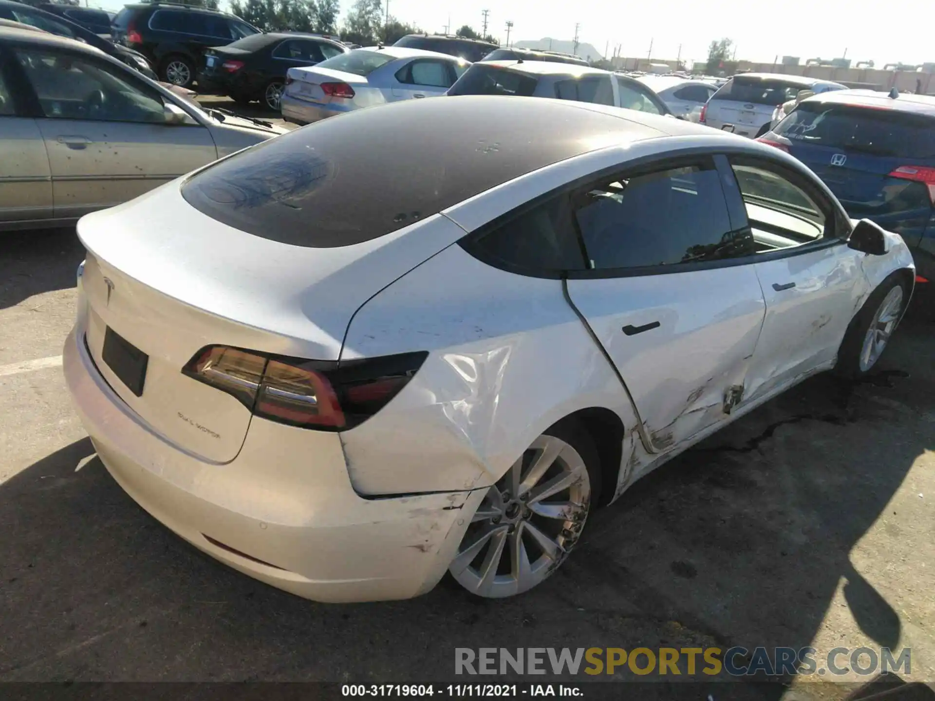 4 Фотография поврежденного автомобиля 5YJ3E1EB9MF078847 TESLA MODEL 3 2021