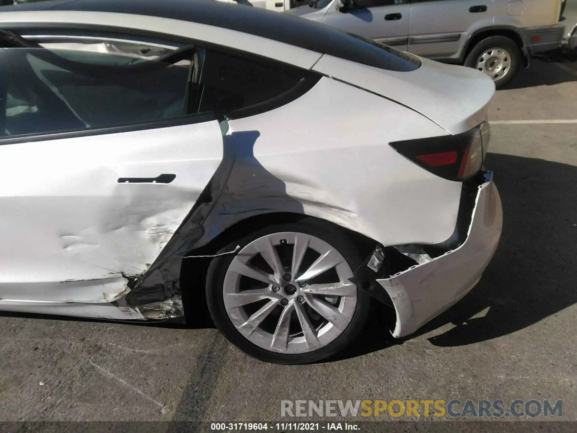 6 Photograph of a damaged car 5YJ3E1EB9MF078847 TESLA MODEL 3 2021