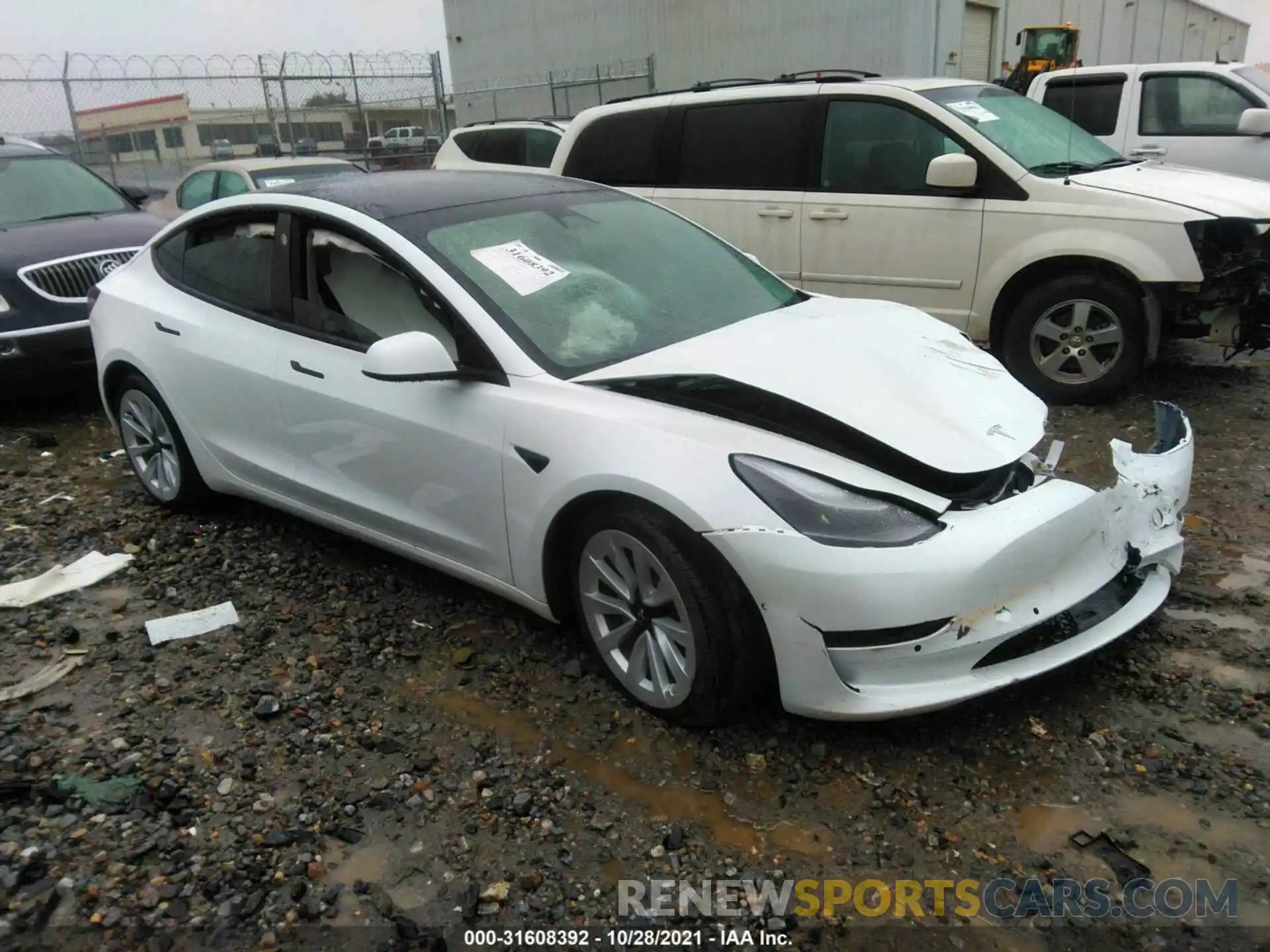 1 Photograph of a damaged car 5YJ3E1EB9MF903463 TESLA MODEL 3 2021