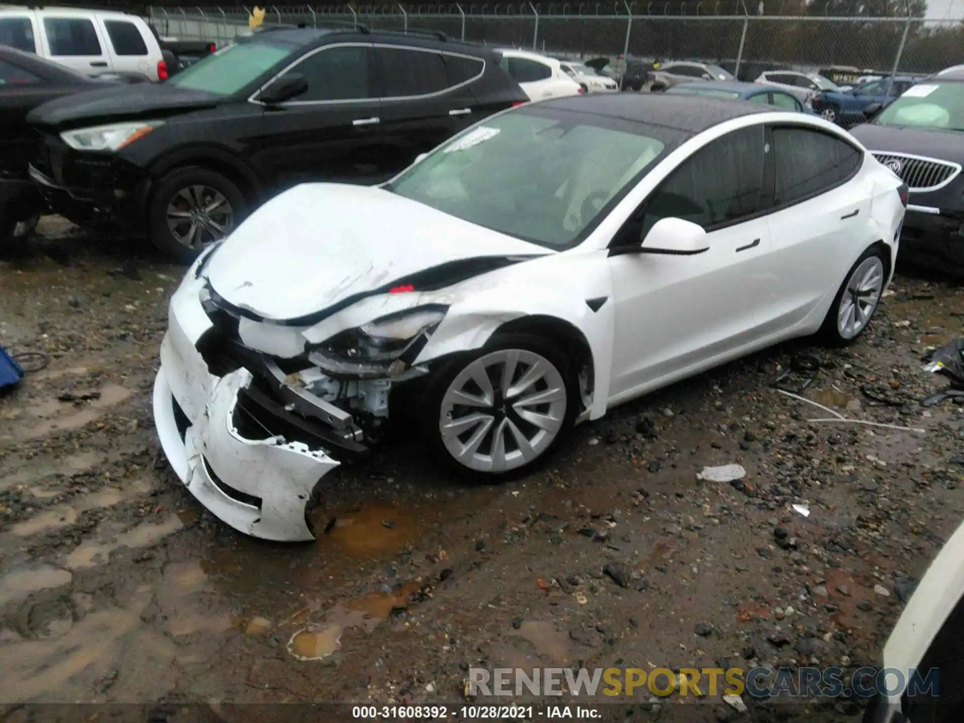 2 Photograph of a damaged car 5YJ3E1EB9MF903463 TESLA MODEL 3 2021