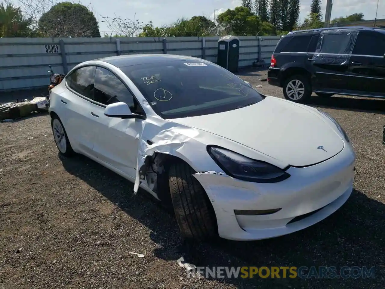 1 Photograph of a damaged car 5YJ3E1EB9MF906718 TESLA MODEL 3 2021