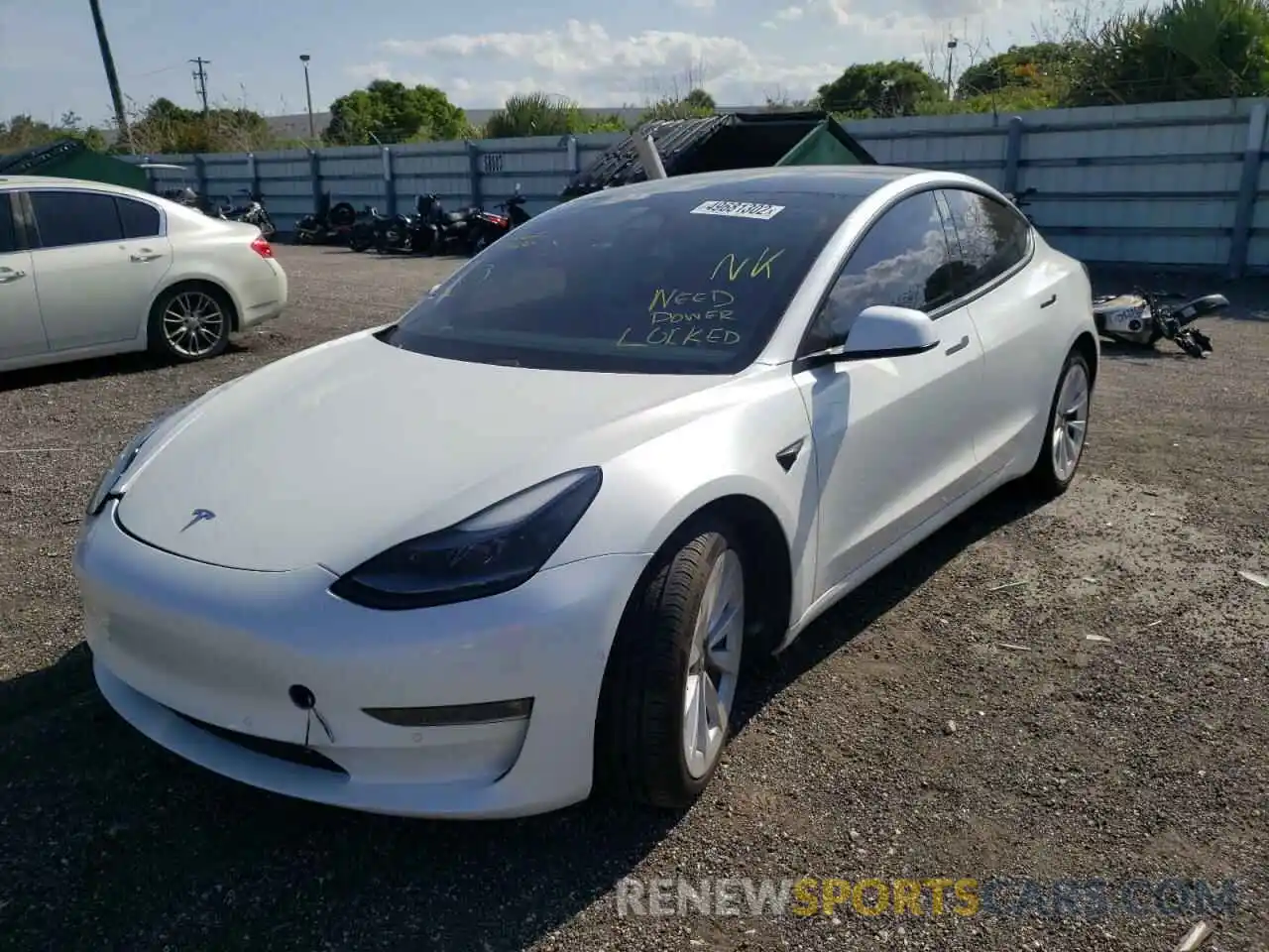 2 Photograph of a damaged car 5YJ3E1EB9MF906718 TESLA MODEL 3 2021