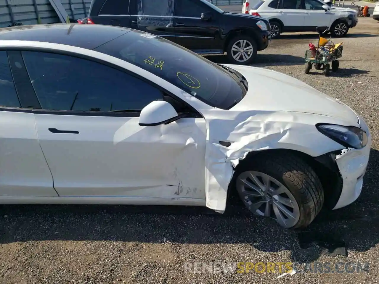 9 Photograph of a damaged car 5YJ3E1EB9MF906718 TESLA MODEL 3 2021