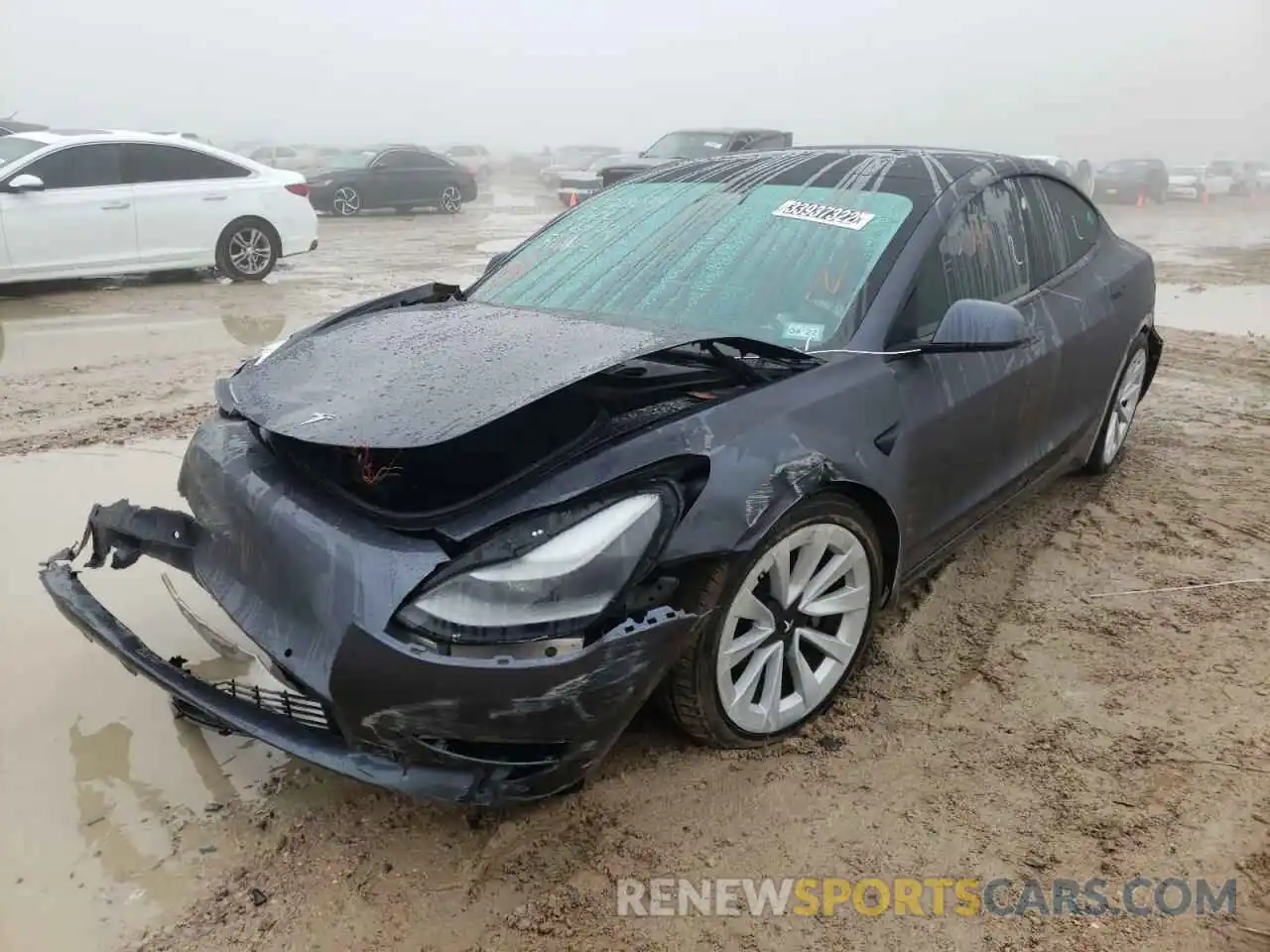 2 Photograph of a damaged car 5YJ3E1EB9MF916195 TESLA MODEL 3 2021