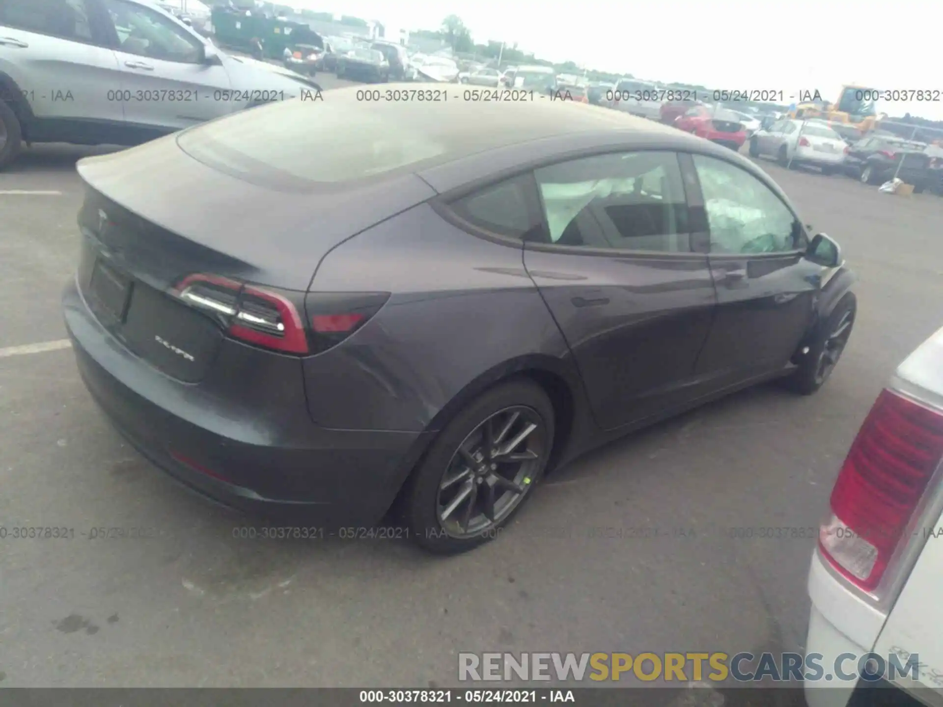 4 Photograph of a damaged car 5YJ3E1EB9MF919162 TESLA MODEL 3 2021