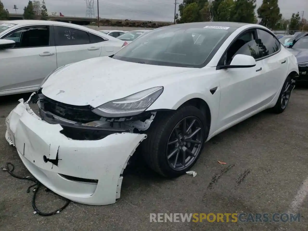 2 Photograph of a damaged car 5YJ3E1EB9MF928198 TESLA MODEL 3 2021