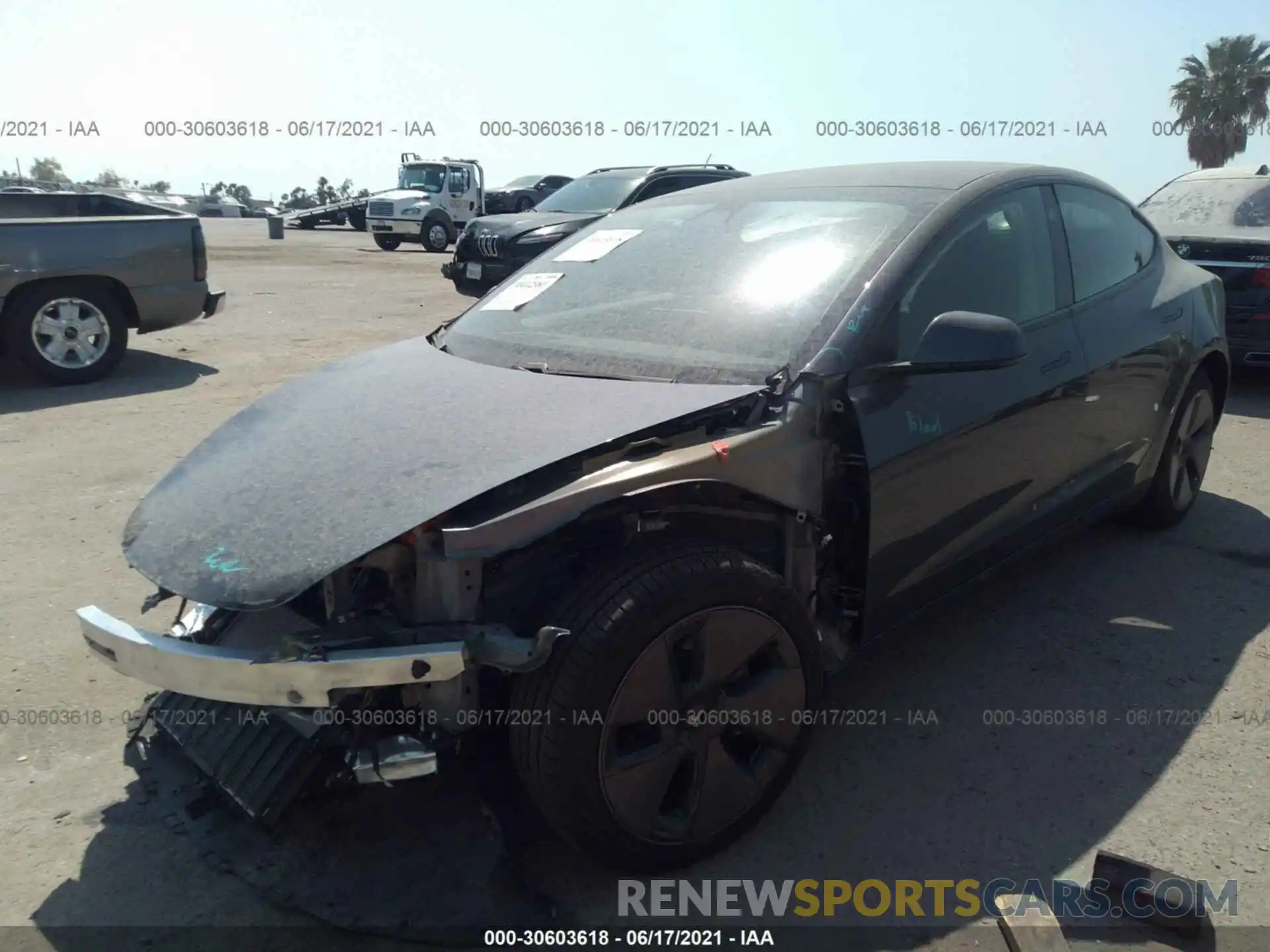 2 Photograph of a damaged car 5YJ3E1EB9MF938441 TESLA MODEL 3 2021