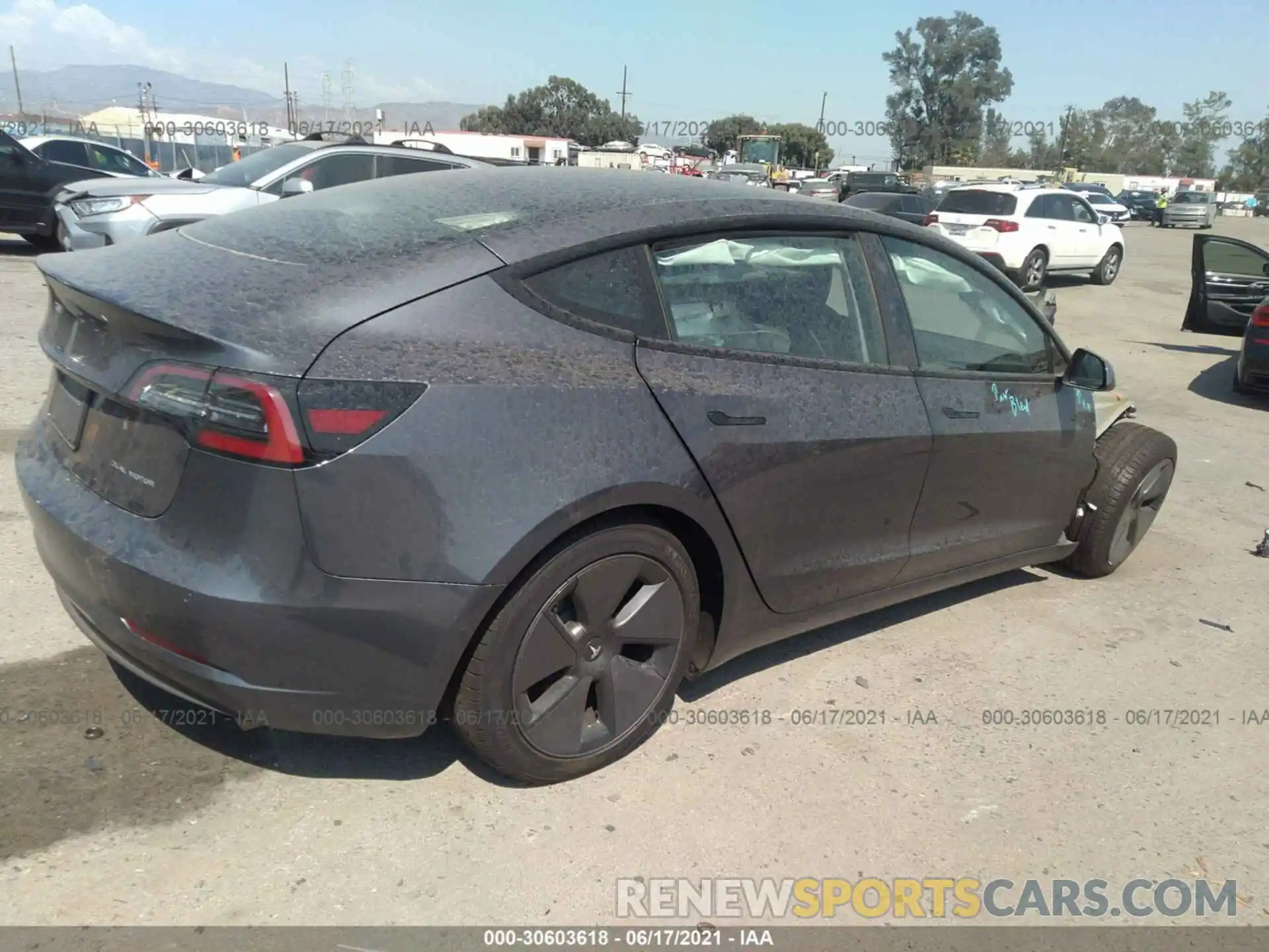 4 Photograph of a damaged car 5YJ3E1EB9MF938441 TESLA MODEL 3 2021