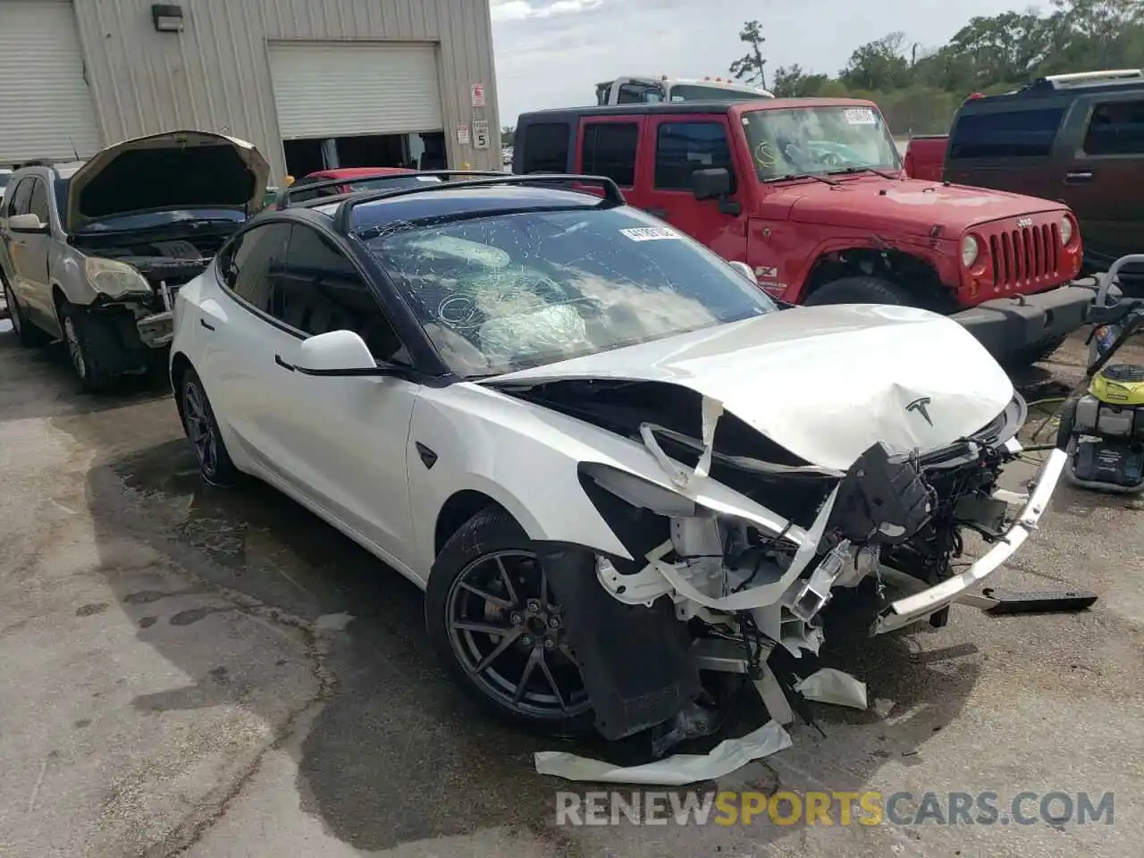 1 Photograph of a damaged car 5YJ3E1EB9MF974324 TESLA MODEL 3 2021