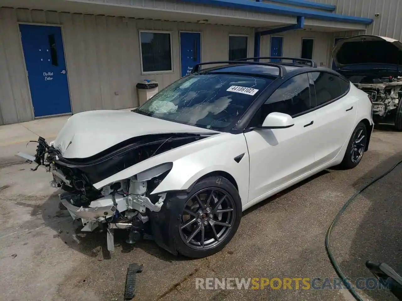 2 Photograph of a damaged car 5YJ3E1EB9MF974324 TESLA MODEL 3 2021