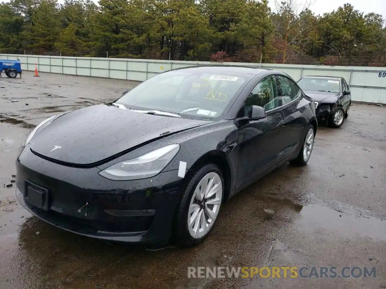 2 Photograph of a damaged car 5YJ3E1EB9MF974999 TESLA MODEL 3 2021