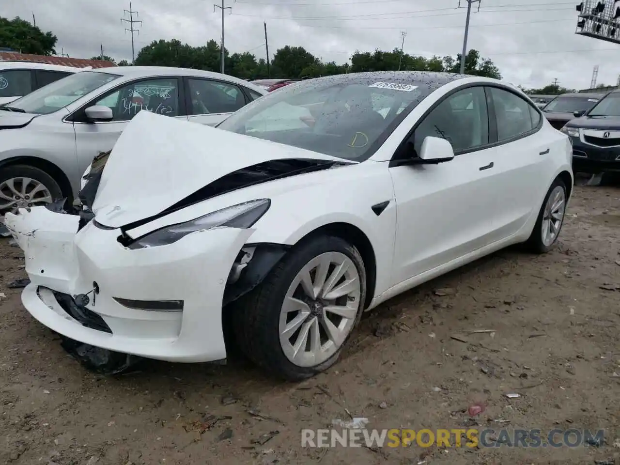 2 Photograph of a damaged car 5YJ3E1EB9MF975327 TESLA MODEL 3 2021