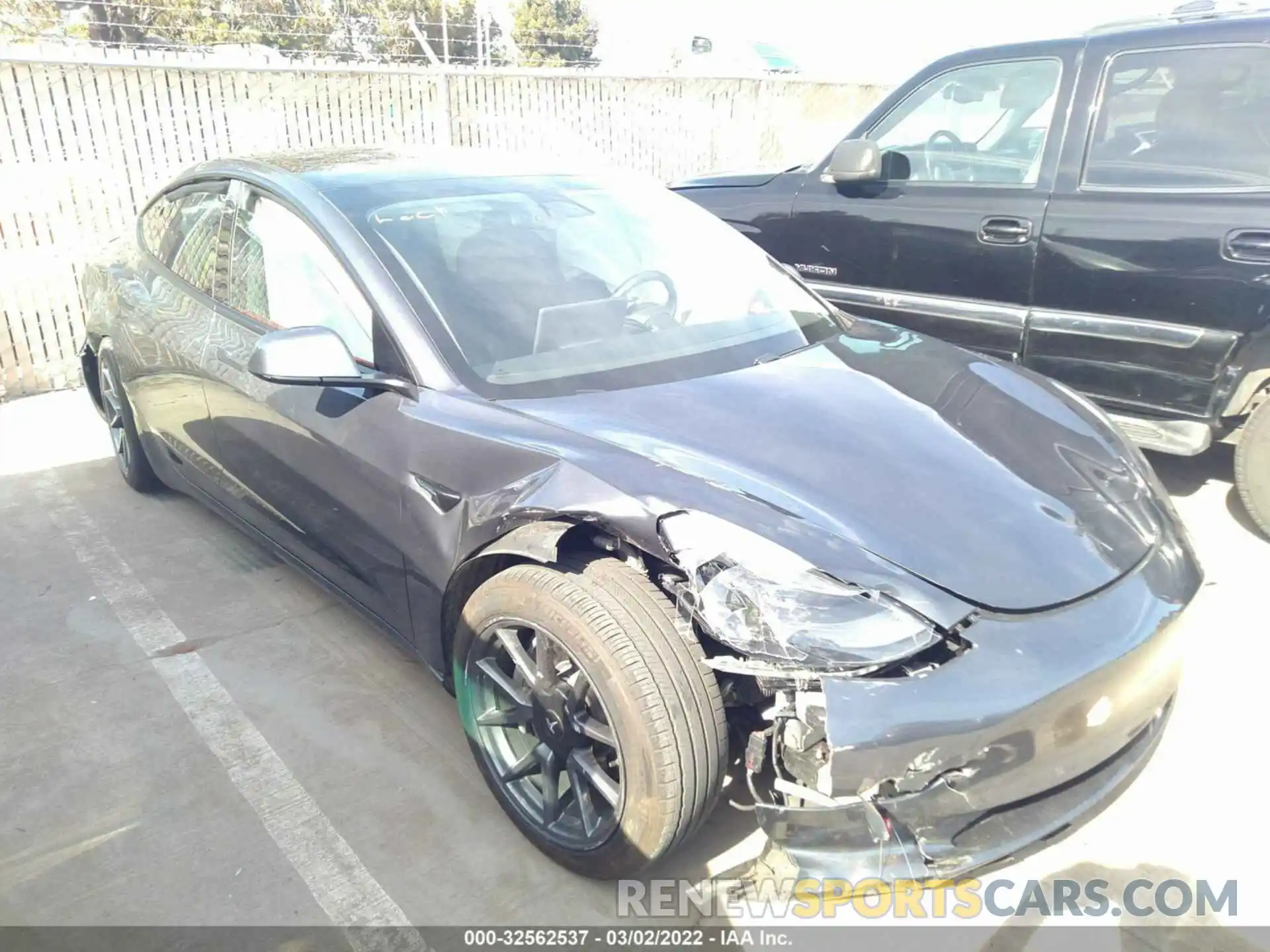 1 Photograph of a damaged car 5YJ3E1EB9MF997912 TESLA MODEL 3 2021