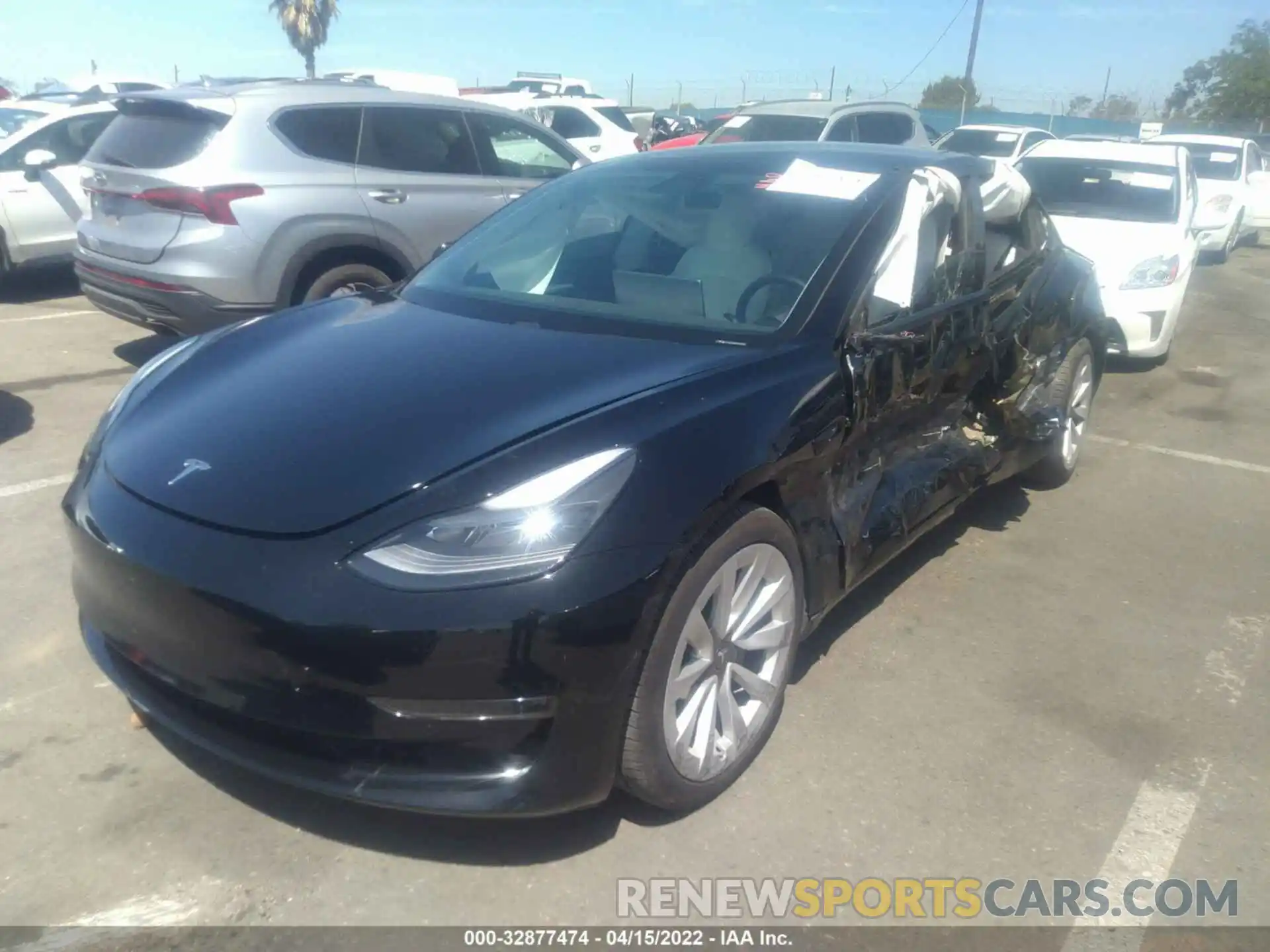 2 Photograph of a damaged car 5YJ3E1EB9MF999630 TESLA MODEL 3 2021