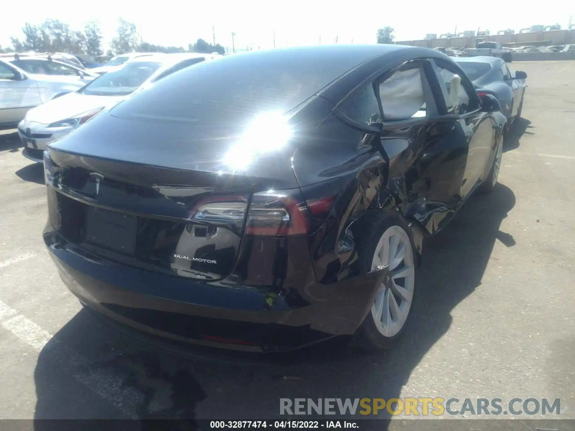 4 Photograph of a damaged car 5YJ3E1EB9MF999630 TESLA MODEL 3 2021